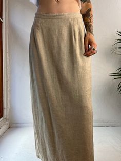 "- Vintage 90s beige denim maxi skirt - 100% rayon - Made in India - Zipper and button closure - Brand: Divine Sarah - Tagged L Waist: 29\" Hip: 19\" Length: 36\"" Beige Maxi Length Spring Bottoms, Beige Maxi Length Bottoms For Spring, Casual Beige Maxi Bottoms, Vintage Long Beige Skirt, Beige Fitted High Waist Maxi Skirt, Beige High Waist Fitted Maxi Skirt, Fitted High Waist Beige Maxi Skirt, Classic Fitted Maxi Skirt For Summer, Fitted Beige Linen Maxi Skirt