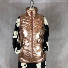 "Everything Old Is New Again - Rose Gold Packable Puffer Vest To Wear Everywhere With Everything This Season \"Xersion\" Brand - Women's Size Small Chest: 38\"-40\" Waist: 36\"-38\" Hips: 40 - 42\"\" Length: 27\" Back Neck to Hem 100% Packable Polyester Space Age Modern Look Great Color Great Cut Great Scott; You'll Love This Vest!" Space Age Modern, Gothic Flowers, Great Scott, Rainbow Scarf, Back Neck, Vest Outfits, Space Age, Small Chest, Puffer Vest