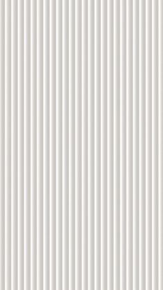 a white wall with vertical lines on it