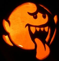 a carved pumpkin with an evil face on it