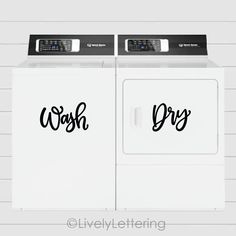 two washers with the words wash dry written in black ink on them, next to each other