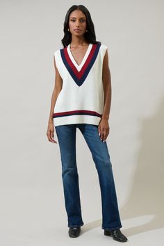 Create a look with the Luxora Color Block Oversized Vest Top. A sleeveless look takes on a deep v-neckline, with an oversized fit on this vest. The color block design has stripes outlined. Pair it with skinny jeans to match. - Deep v-neck- Sweater- Color block- Oversized fit- Color: White MultiSize + Fit - Model is 5'10" and wearing size XS- Measurements taken from size S - Chest: 21 1/2"- Length: 24 1/4" Fabric Self: 100% Acrylic Style Number STT17478 White V-neck Top With Contrast Stripes, Chic Striped V-neck Vest, Striped V-neck Tank Top, Casual Striped V-neck Sweater Vest, White Sleeveless Tank Top With Contrast Stripes, Striped V-neck Vest Top, White V-neck Vest For Fall, White V-neck Tops With Contrast Stripes, V-neck Tops With Contrast Stripes For Spring