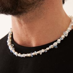 If it's not the real deal, it's not CRAFTD. This necklace features Genuine Clear Blue Quartz hand-strung alongside all-natural freshwater pearls. Each pearl is unique and sourced directly from Mother Nature, ensuring a one-of-a-kind piece for your collection. With its premium lobster clasp and adjustable length, customization is effortless. Wear it solo as a statement piece, or layer it with your favourite gold chains﻿ for a versatile and layered look. ✓ Real Freshwater Pearls✓ 18K Gold & 316L S Blue Baroque Pearl Necklace With Pendant, Handmade Blue Baroque Pearl Necklace, Blue Baroque Pearl Necklace With Pearl Charm, Blue Baroque Pearl Necklace As A Gift, Blue Beaded Pearl Necklaces With Pearl Pendant, Blue Baroque Pearl Jewelry With Pearl Pendant, Blue Baroque Pearl Jewelry With Pendant, Blue Baroque Pearl Pendant Jewelry, Ice Necklace