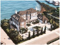 an artist's rendering of a large mansion by the water