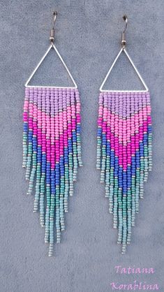 These unique handmade earrings are made of high-quality Czech beads and strong synthetic thread. They are elegant, fashionable, and highly versatile, suitable for everyday wear. There may be some color discrepancies which is due to the different monitor settings 100% hand made with love! Measurements: Length-about 13.5cm (5.11 inch) Width -about 3 cm (1.18 inch) Materials: Stainless steel components Czech glass beads Strong bead weaving thread Trendy Handmade Dangle Chandelier Earrings, Handmade Trendy Chandelier Dangle Earrings, Trendy Beaded Dangle Chandelier Earrings, Trendy Colorful Dangle Beaded Earrings, Trendy Colorful Beaded Dangle Earrings, Pink Tassel Earrings With Colorful Round Beads, Multicolor Chandelier Earrings With Tassels And Round Beads, Multicolor Tassel Chandelier Earrings With Round Beads, Trendy Multicolor Handmade Chandelier Earrings