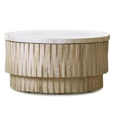 a round table with wooden slats around it