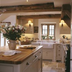 An English countryside kitchen with wall sconces for ambient lighting, creating a cozy and inviting atmosphere English Kitchen Ideas, English Cottage Kitchens, Countryside Kitchen, Country Cottage Kitchen, English Kitchens, Cottage Interior, Form And Function, Cottage Kitchens, Cozy Kitchen