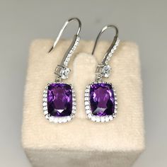 Natural Amethyst Earring, 925 Silver Dangle Earrings, AAA Quality Amethyst Earrings, Gift For Women, 925 Silver Jewellery. Stone :- Natural Amethyst Amethyst Origin:- Brazil Amethyst Shape:- Cushion Amethyst Size:- 10x14 MM Side Stone:- Zircon Metal :- 925 Silver Earring Length:- 45 MM Earring:- Width:- 11.50 MM Earring Weight:- 10.50 Gram Formal Amethyst Drop Earrings, Amethyst Drop Earrings For Anniversary, Elegant Amethyst Drop Earrings, Elegant Purple Crystal Pierced Earrings, Fine Jewelry Amethyst Earrings With Prong Setting, Fine Jewelry Amethyst Earrings For Pierced Ears, Classic Amethyst Drop Earrings, Classic Amethyst Drop Earrings Jewelry, Elegant Amethyst Dangle Earrings