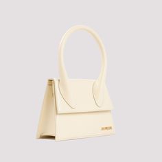 Jacquemus Ivory White Cow Leather Le Grand Chiquito Handbag. Handles on top, front flap fastening, front metallic lettering logo, adjustable and detachable shoulder strap, one main compartment, fully cotton lining. Gold-tone hardware.Measures: W:24cm H:18cm D:9,5cmGender: WOMENMaterial: 100%COTTON 100%COW LEATHERColor: BEIGEMade in: ITProduct ID: 213BA003.3060*Import tax/duty will be calculated at checkout (If applicable) Beige Double Handle Flap Bag With Dust Bag, White Baguette Bag With Dust Bag For Evening, White Baguette Bag For Evening With Dust Bag, Designer Beige Shoulder Bag With Adjustable Handle, Luxury Cream Baguette Bag With Detachable Strap, Beige Double Handle Baguette Bag For Evening, Cream Top Handle Baguette Bag With Removable Pouch, Cream Baguette Bag With Detachable Strap For Evening, Chic Cream Baguette Bag With Double Handle