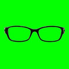 a pair of black glasses against a green background