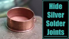 a close up of a metal object with the words hide silver solder johns on it