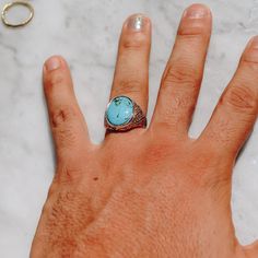 Classic style Indonesian ring in sterling silver with an oval Chrysocolla stone. This vibrant blue ring looks great on any finger for both women and men. Chrysocolla is a copper stone that resonates with the vibrations of the Earth and helps clear blockages from the throat chakra. It promotes clear communication and the courage to express oneself. Available in Gold Brass https://etsy.me/2msAubC Ring Size Available in all sizes. Please be sure to find your exact ring size for the finger you want Blue Oval Cabochon Signet Ring With Polished Finish, Blue Oval Signet Ring For Promise, Blue Oval Signet Promise Ring, Oval Turquoise Signet Ring In Sterling Silver, Oval Turquoise Sterling Silver Signet Ring, Turquoise Oval Sterling Silver Signet Ring, Stone Ring For Men, American Rings, Stone Rings For Men