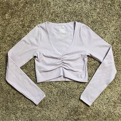 -Women’s Medium -Ribbed And Seamless Material -Light Violet Color -Long Sleeve Shirt -Ruched V-Neck Neckline -Cropped Fit -Brand New Light Violet, Violet Color, Long Sleeve Crop, Wild Fable, Long Sleeve Crop Top, Sleeve Shirt, Violet, Long Sleeve Tees, Long Sleeve Shirts