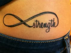 a woman's stomach with the word strength written in cursive font on it