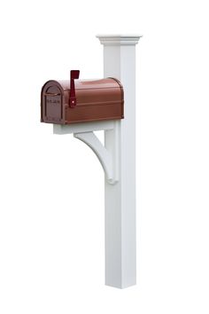 a white post with a brown mailbox on it's top and one red box in the middle