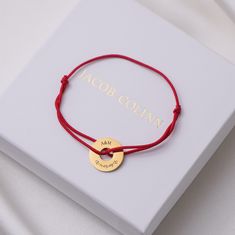 DETAILS: * Unisex red string bracelet * Two adjustable sizes: Female / Male * String material: Satin * Made from quality materials: stainless steel & satin thread * Engraving: Long lasting, made by laser * Water resistant * Non-allergic to skin (nickel free) * Packaging in original gift box * Warranty: 12 months * SET for two bracelets here: https://etsy.me/3XLRHty MEANING OF RED STRING BRACELET Throughout history and across philosophies, the red string has been worn for protection, faith, good luck, strength, and connection. While there are different views about the properties of red thread, it is viewed as a powerful tool across cultures.  It also symbolizes the bond of love between two people or a family, so it is often chosen by couples. SIZES: The red thread bracelet comes in two adju Red Adjustable Cord Friendship Bracelets As Gift, Red Adjustable Friendship Bracelets As Gifts, Personalized Red Wristband Gift, Personalized Red Name Bracelet For Friendship, Red Adjustable Cord Friendship Bracelets For Gifts, Red Adjustable Cord Friendship Bracelet Gift, Adjustable Red Name Bracelet For Gift, Red Adjustable Cord Bracelet As Gift, Personalized Red Adjustable Name Bracelet