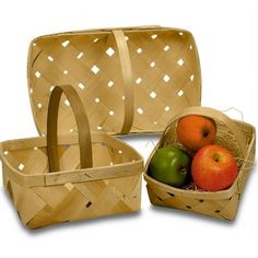 three baskets with apples and two oranges in them, one has a straw bag