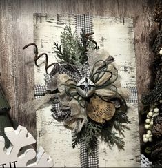 a close up of a christmas ornament on a wooden surface