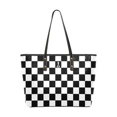 "This spacious bag is both convenient and stylish.  Carry it by the strap or go hands free with it over your shoulder.  There is also a pocket inside with a zipper closer.  The design features a checkered pattern, simulating a Chess board, with the iconic \"Buenos New Chess\" app logo centered on a dark square on the upper half of each side. .: Black and White .: PU leather .: Zipper closure .: Inner pocket with zipper .: Printed on both sides Length:         14.56 inches Width:           6.10 i Chess App, Elastic Thread, Tote Bag Black, App Logo, Gifts For My Wife, Leather Zipper, Shoulder Tote Bag, Checkered Pattern, Black Tote Bag