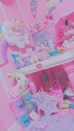 there are many toys on the shelf in this room with pink walls and flooring