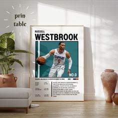 a basketball player holding a ball in front of a poster with the words westbrook on it