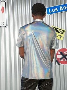 Achieve a unique look with this Men's Holographic Short Sleeve Shirt. It offers a cool design and is crafted from a lightweight fabric that is soft and comfortable. Featuring short sleeves, this shirt is eye-catching and designed to be a conversation starter. 95%Viscose, 5%PolyamideImportedButton closureHand Wash or Machine Wash Men's Size Chart Small Medium Large XL XXL Chest 21 22 23 24 25 Bottom Opening 18 1/2 19 1/2 20 1/2 21 1/2 22 1/2 Back Length 26 1/2 27 1/2 28 1/2 29 1/2 30 1/2 Shoulder 18 1/2 19 1/2 20 1/2 21 1/2 22 1/2 Sleeve Length 35 36 37 38 39 Fitted Short Sleeve Graphic Print Shirt, Cool Short Sleeve Tops With Relaxed Fit, Modern Short Sleeve Shirt With Graphic Print, Modern Short Sleeve Graphic Print Shirt, Cool Relaxed Fit Short Sleeve Tops, Modern Short Sleeve Graphic Shirt, Modern Collared T-shirt For Summer, Holographic Top, Blue Short Sleeve Shirt