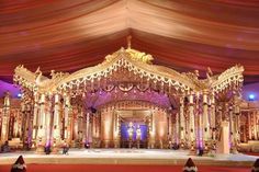 an elaborate stage set up for a wedding