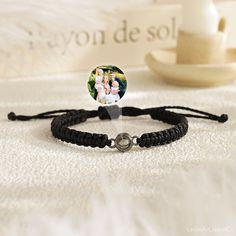 Customized Photo Projection Bracelet, Braided Rope Bracelet for Her, Picture Bracelet, Photo Picture Inside,Memorial Gift,Gift for Boyfriend ------------------------------------------- HOW ∙ TO ∙ ORDER * S T E P 1 Make your selections from the drop-down boxes within the listing. * S T E P 2 Add to Cart and Checkout * S T E P 3 Send me your high-quality image via messages. (Send pictures to Etsy message, button below the store). - Please send me your photo of choice after purchase for a customisa Engraved Braided Bracelet Gift, Engraved Braided Bracelet As Gift, Engraved Braided Bracelets As Gift, Personalized Braided Bracelet Gift, Engraved Round Braided Bracelets As Gift, Personalized Black Friendship Bracelets, Adjustable Bracelet For Mother's Day Keepsake, Photo Projection Bracelet, Picture Bracelet