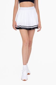 This Pleated Tennis Skirt is crafted for style and comfort. It features a high-end grosgrain ribbon trim and built-in undershorts with pockets for extra coverage. Enjoy the perfect pleats and added convenience for your next match. Fabric & fit: 100% recycled polyester Model is wearing size Small. Pleated Tennis Skirt, Tennis Skort, Small Dress, Ribbon Trim, Tennis Skirt, White Skirts, Quality Fashion, How To Feel Beautiful, Grosgrain Ribbon