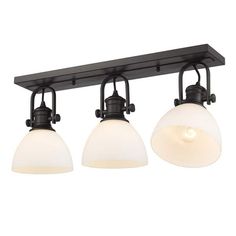 three light bathroom fixture with black finish and frosted glass shades on the bulbs,