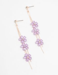 Captivate with these Rose Gold Purple Floating Flower Drop Earrings. Delicate purple flowers float gracefully, adding enchanting elegance to any outfit. Crafted in rose gold, they bring a sophisticated, on-trend vibe. Color: Purple Dimensions: Length 75 mm x Width 12 mm | Lovisa Rose Gold Purple Floating Flower Drop Earrings Purple Flower Jewellery, Floating Flower, Garden Theme Wedding, Quinceanera Ideas, Flower Drop Earrings, Floating Flowers, Earrings Purple, Purple Earrings, Colour Purple