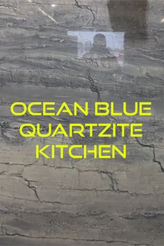 the words ocean blue quartz kitchen written in yellow