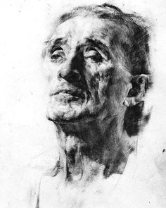 a black and white drawing of a man's face