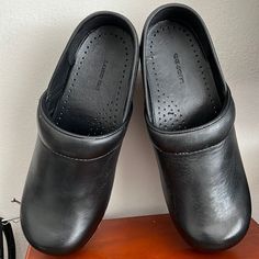 Never Wore,Excellent Condition, Smoke Free Home. Classic Slip-resistant Clogs With Round Toe, Slip-on Workwear Clogs With Protective Feet, Classic Non-slip Closed Toe Clogs, Classic Closed Toe Non-slip Clogs, Non-slip Round Toe Clogs For Work, Classic Black Slip-on Clogs, Non-slip Slip-on Clogs For Work, Classic Black Synthetic Clogs, Slip-resistant Round Toe Clogs For Work