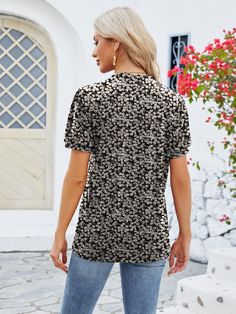 This playful blouse features ruched detailing and a unique printed pattern. With a flattering notched neckline and comfortable short sleeves, it's the perfect addition to your wardrobe. Stand out from the crowd with this quirky and stylish top. Features: Ruched Sheer: Opaque Stretch: Slightly stretchy Material composition: 65% rayon, 30% polyester, 5%spandex Care instructions: Machine wash cold. Tumble dry low. Imported Size US Top Length Bust Sleeve Length S 4 25.6 37.4 10.2 M 6/8 26 39.4 10.6 Notched Neckline, Athleisure Tops, Evening Dresses Plus Size, Maxi Dress Cocktail, Maxi Dress Formal, Graphic Tops, Cardigan Jacket, Short Sleeve Blouse, Skirt Pants