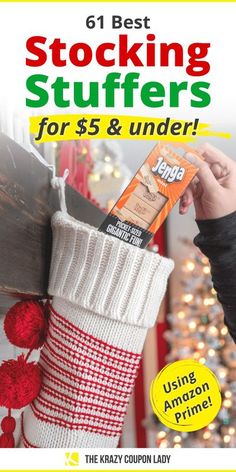 a person holding up a stocking stuff in front of a christmas tree with the text 6 best stocking stuff stuffings for $ 5 and under