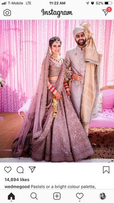 two people standing next to each other in wedding outfits