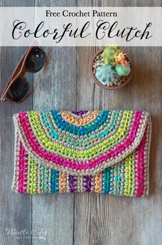 the free crochet pattern for a colorful clutch purse is shown on a wooden table