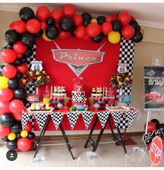 an image of a birthday party setting with balloons and desserts on the buffet table