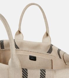 Height 35cm-14"
Max. width 62cm-24.5"
Max. depth 22cm-8.5"
Length of handles 47cm-18.5" Chic Canvas Bag With Rolled Handles, Chic Canvas Bags With Rolled Handles, Luxury Beige Canvas Tote Bag, Designer Beige Shoulder Bag With Rolled Handles, Designer Cream Canvas Shoulder Bag, Luxury Beige Canvas Bag With Handles, Designer Beige Top Handle Canvas Bag, Designer White Bag With Canvas Lining, Luxury Cotton Bags For Everyday Use