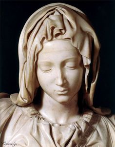 a close up of a statue of a woman's head with a veil on her head