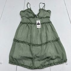 Angashion Green Ruffle Square Print Sleeveless Dress Women’s Size Medium. Condition Is New With Tags See Pics Ls322/22 J3 Lh27 Green Mini Dress With Ruffled Straps For Vacation, Green Vacation Mini Dress With Ruffled Straps, Green Sundress With Ruffled Straps, Green Ruffled Straps Sundress For Summer, Green Sundress With Ruffled Straps For Summer, Green Ruffled Straps Sundress For Spring, Green Sleeveless Mini Dress With Ruffles, Green Mini Sleeveless Dress With Ruffles, Green Sleeveless Beach Dress With Ruffles