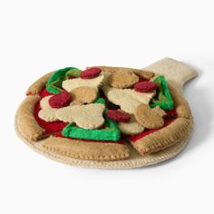 a stuffed animal pizza sitting on top of a table