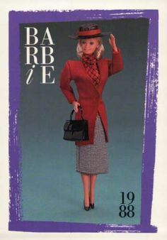 the barbie doll is wearing a red coat and plaid skirt with matching hat, purse