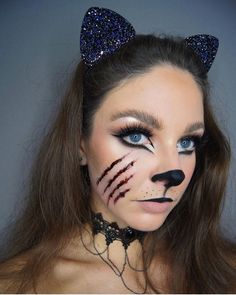 Scary Cat Face Paint, Cat Scratch Makeup, Scary Cat Makeup Halloween, Zombie Cat Makeup, Scary Cat Halloween Makeup, Claw Marks Makeup, Cute Wolf Makeup, Cat Woman Halloween Makeup, Cat Costume Hairstyles