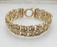 Polished Bold Double Eight Infinity  Link Bracelet Real 14K Yellow Gold     Metal Condition Finish Avg. Weight Width Length Clasp Type Retail Price Real 14K Yellow Gold (Stamped 14K)  Brand New Polished 11.80 grams 16.3mm ~ 5/8" 7" Spring Ring Clasp $2124 Gold Infinity Jubilee Bracelet, Handmade Yellow Gold Bracelet For Anniversary, Gold Sign, Fine Jewelry Bracelets, Wrapped Jewelry, Bracelets And Charms, Wire Wrapped Jewelry, Spring Rings, Link Bracelets