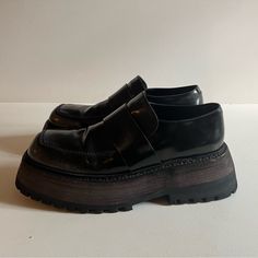 Buffed Leather Loafers In Black. Fading Throughout. Square Toe. Tonal Leather Strap At Vamp. Tonal Suede And Buffed Leather Lining. Platform Midsole. Treaded Rubber Outsole. Approx. 1.75 Platform. Black With Unique Gray Fading Throughout. Best Ankle Boots, Tie Sandals, Swim Shoes, Shoes Brand, Slingback Sandal, Green Leather, Timberland Boots, Leather Slip Ons, Leather Ankle Boots