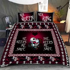 a bed covered in a red and black comforter with the words queen king on it