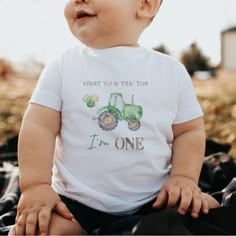 a baby wearing a t - shirt that says, start your treat tour i'm one