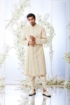 This two-tone beige sherwani set features all over gota patti embroidery on a raw silk base. The ensemble is paired with a grey silk kurta and a gold twill patiala salwar. Complimenting stole and footwear is also available.From Seema Gujral's Tuscan Summer collection. DELIVERY TIMEPlease allow 8-12 weeks for your outfit to arrive.FABRIC DETAILSRaw SilkProfessional cleaning only. Gota Patti Embroidery, Seema Gujral, Embroidered Sherwani, Salwar Pants, Sherwani Groom, Embroidery Fashion Detail, Sherwani For Men, Patiala Salwar, Silk Kurta